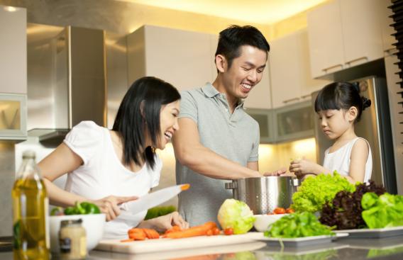 A family cooking together.