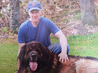 Kevin Laski at home with one of his beloved Leonberger dogs, Zandor.