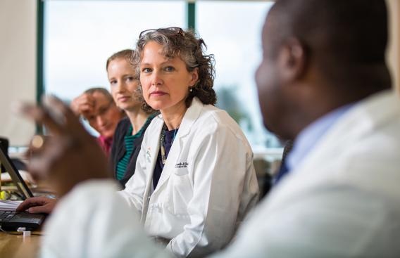 Dartmouth-Hitchcock physicians listening to a speaker.