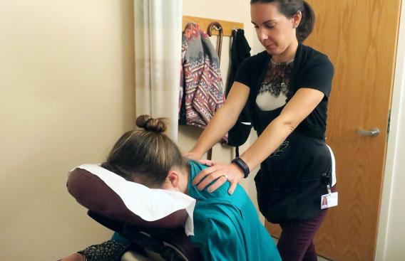 Patient receiving reiki massage