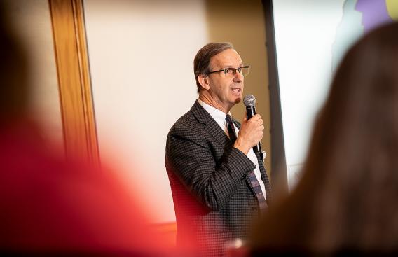 Dr. Will Torrey speaking at public forum.