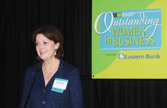 Joanne M. Conroy, MD, accepts NH Business Review Outstanding Women Leader award.