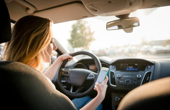 teen driving while texting