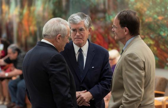 Former chief justice and senior director of external affairs at D-H, John Broderick chats with Vermont Supreme Court Chief Justice Paul Reiber, and New Hampshire Supreme Court Chief Justice Robert Lynn
