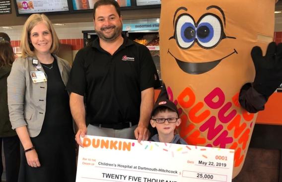 Eliot Perry accepts check