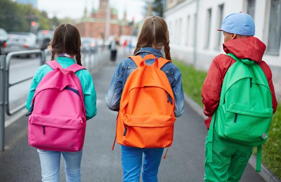 children with backpacks