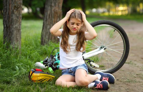 Young girl riding bike