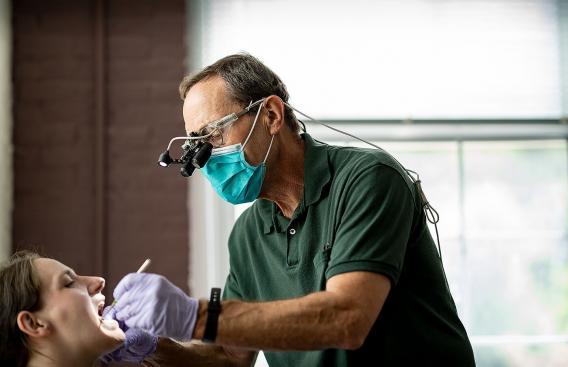 Dentist helping Moms in Recovery