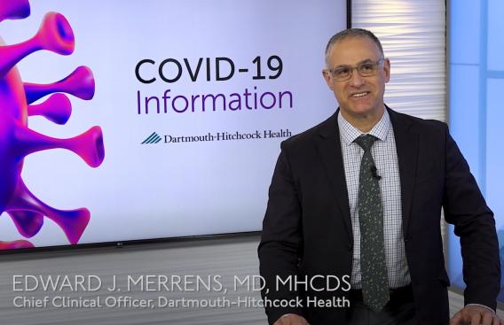 Photo of Ed Merrens, MD giving the video update on set at DHMC.