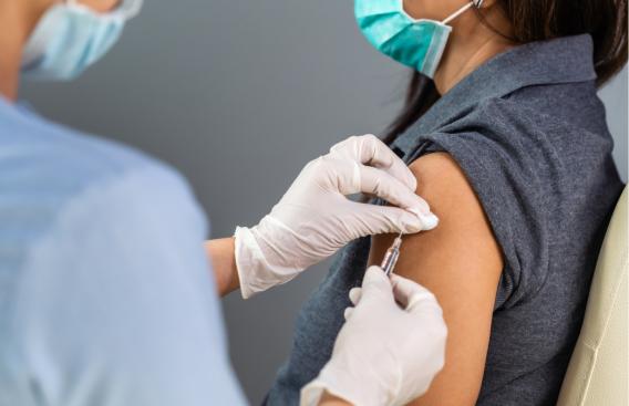 Photo of someone receiving an injection.