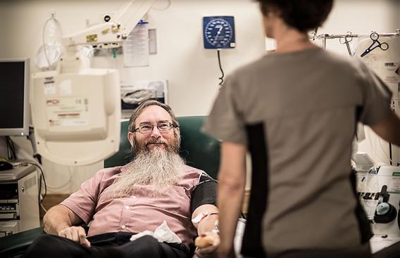 Dean Peel donates blood