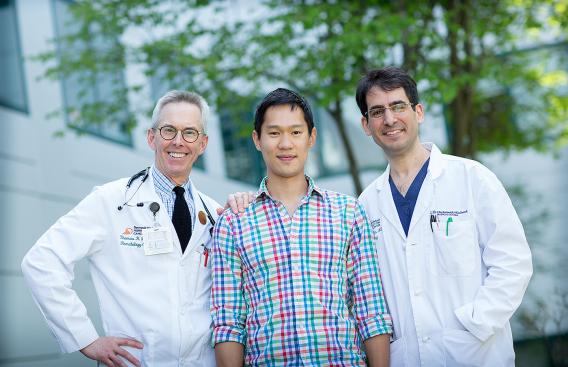 Tuck MBA student Eugene Hooi with his D-H care team: NCCC oncologist Thomas H. Davis, MD, (left), and chief of Otolaryngology, Head & Neck Surgery Joseph A. Paydarfar, MD, FACS (right).