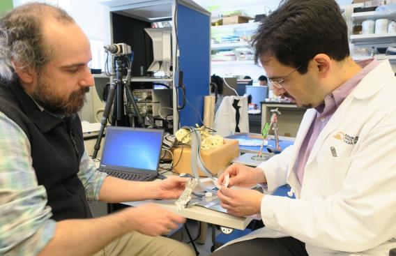 Research scientists Ryan Halter, PhD, and Joseph Paydarfar, MD