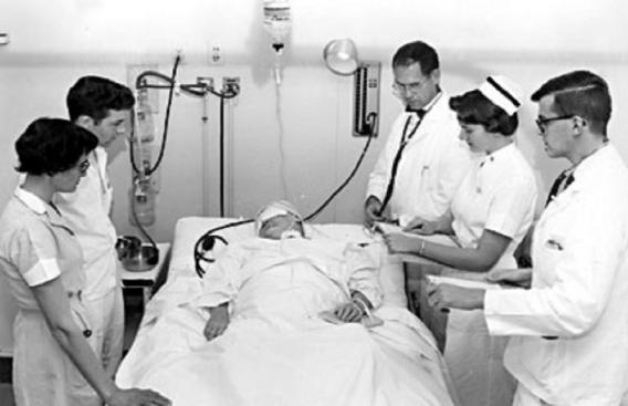 Doctors, nurses, and a patient
