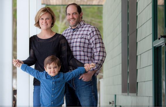 Aimee Giglio with her son and husband